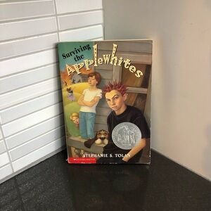 Surviving the Applewhites paperback book